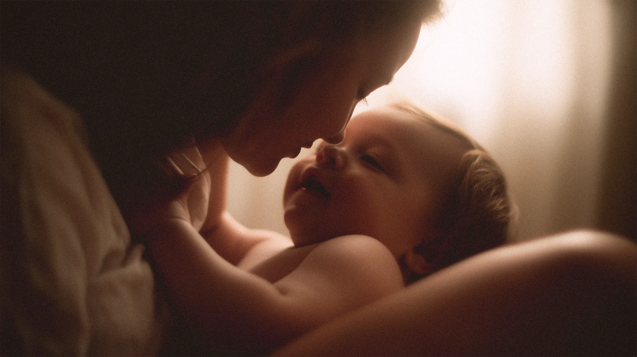 A mother holding her newborn, a deeply personal moment that embodies Forma's whole-person approach to fertility care